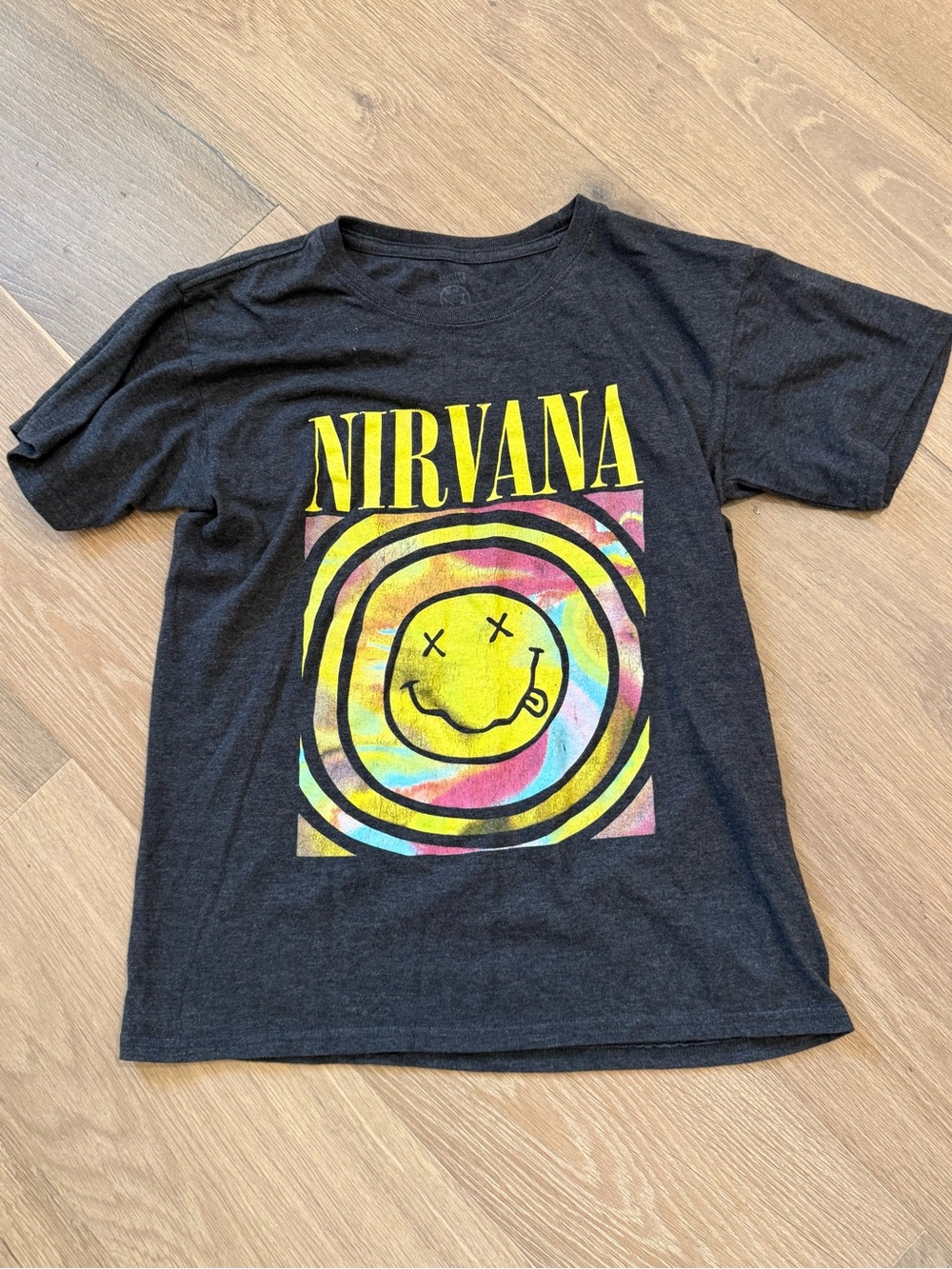 NIRVANA Black Tee with Yellow Logo and Multicolor Tie-Dye Smile